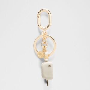 NWT Lululemon Everywhere Belt Bag Charm Keychain Gold